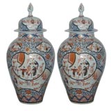 A Pair Of Chinese Imari Porcelain Jars with Covers