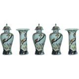 A Set Of Five Porcelain Jars With Covers