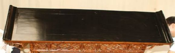 A very beautiful and elegant bamboo altar table, black lacquer top ended in everted flanges, intricate geometric lattice fret work. View our website at: www.greenwichorientalantiques.com for additional 