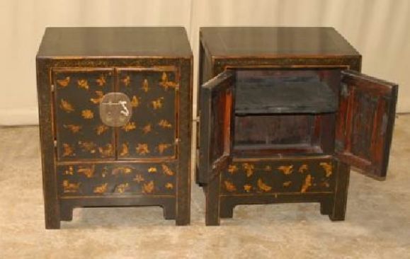 A Pair of Black Lacquer Chests With Gold Gilt Motif