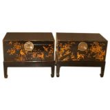 A Pair Of Black Lacquer Trunks With Gold Gilt Motif