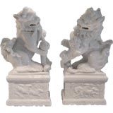 Pair of White Glazed Chinese Ceramic Foo Dogs