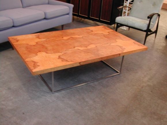 Custom burl coffee table on a polished chrome base.  Made to customer specifications.  Multiple choices in materials used for this custom table.  Pricing is for this specific table replication.