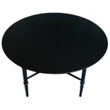 A  Bamboo & Black Glass Table from the Estate of Geoffrey Beene