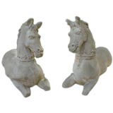 A Pair  cement  cast horses from The Estate of Geoffrey Beene