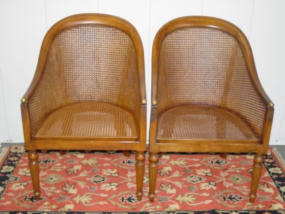 A Fine Pair of West Indian Plantation Chairs, in beautiful light mahogany woods,the caning  is in excellent condition.