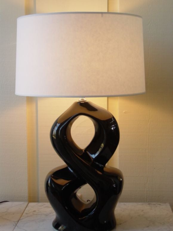 A n  Outstanding  Pair of 1950s Black Ceramic Lamps.