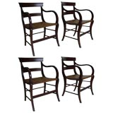 A Set of Four "Very Curvaceous"Regency  Style Arm Chairs