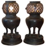 A Pair of Bronze Out Door Garden Lamps