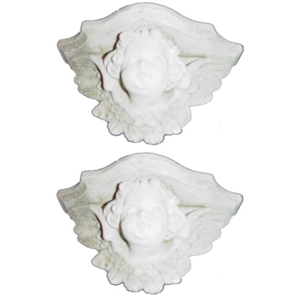 A Pair of Cherub Wall Mounts