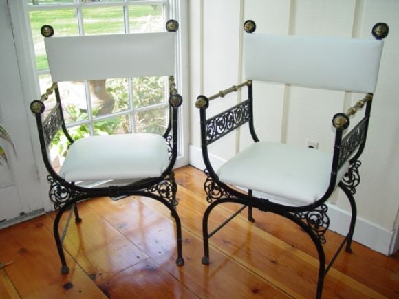 Cast and Wrought iron open armchairs of 