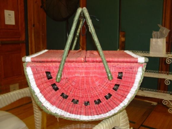 A charming little hand made picnic basket from New England,in red white and green and black seeds.