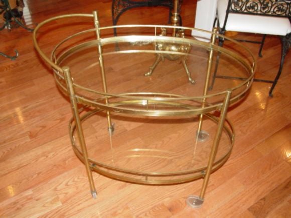 Art Deco, Brass and Glass oval tea or bar cart.