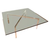 Polished  Stainless Steel and Glass coffee table.