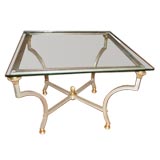A 1930s Polished Steel and glass table.