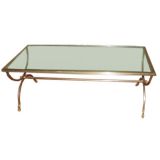 Elegant polished steele, brass and glass coffee table.