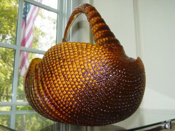 A Beautiful Armadillo  Shell Basket,in rich auburn and mahogany tones,origional and intact.