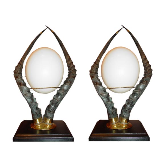 Pair of African Impala Horns Stands with Ostrich Eggs.