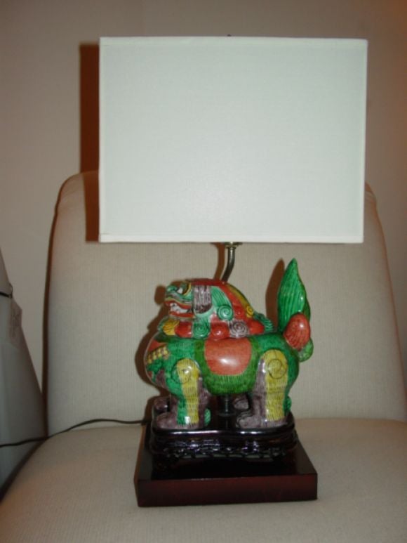 Charming Pair of very colorful ceramic foo dog lamps.