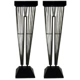 Pair of Wire Stands Masquerading as legs.