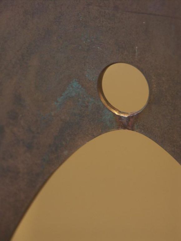 Silicon bronze gong by Harry Bertoia, abstractly in the form of a molar tooth. Years before the CNC maching process, Bertoia was creating fantastic forms with incredible precision. The surface is patinated in a deep brown, with inclusions of lighter