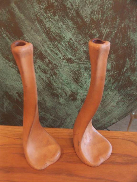 Beautiful pair of terracotta candlesticks by noted jewelry designer Elsa Peretti. Created in Italy in the 1970's and retailed through Tiffany and Co. This Pair if from the estate of Andy Warhol.
