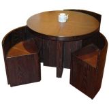 "andaman" table with four nesting chairs