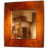 handmade mirror frame in antique bamboo trimmed w/ claro walnut