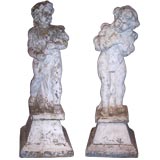 Pair of Baroque Style Painted Cast Stone Putti