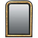 Louis Philippe Period Ebonized and Parcel Gilt Mirror