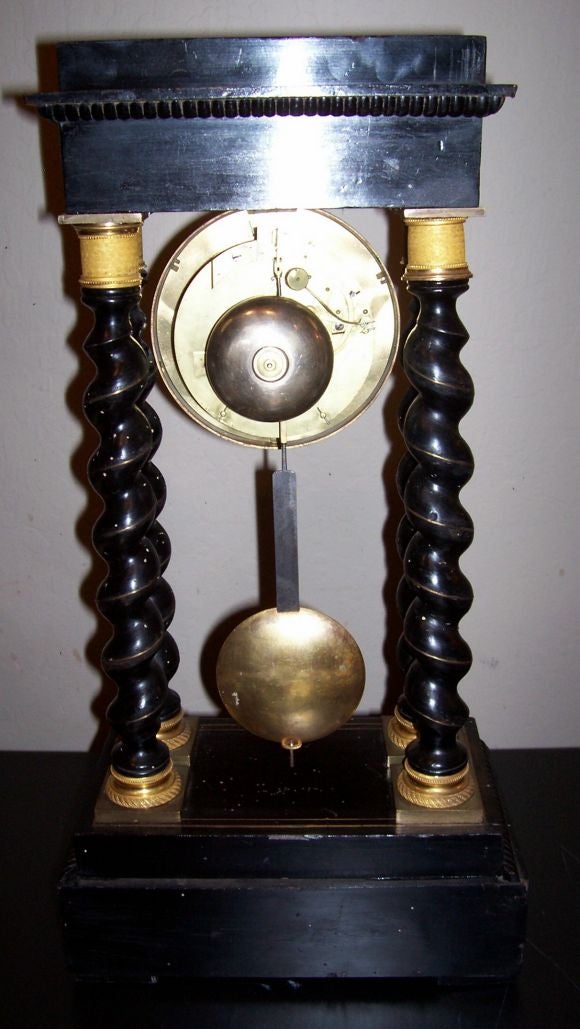 French Gilt Bronze Mounted Ebonized Portico Clock