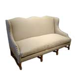 Antique Upholstered Wingback Sofa