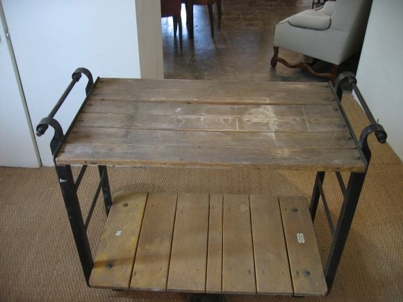Heavy Iron trolley on four wheels.