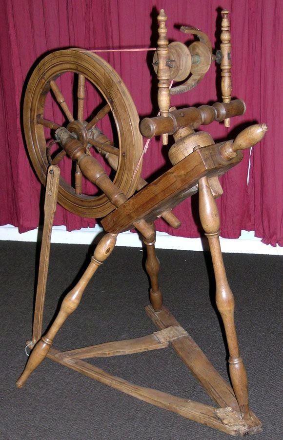 old fashioned spinning wheel