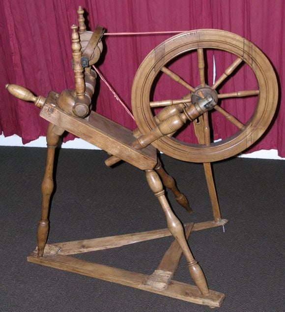 old fashioned spinning wheel