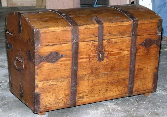 This chest looks like it is straight out of Treasure Island! It has great wrought iron strapping, hinges and hardware. All original.