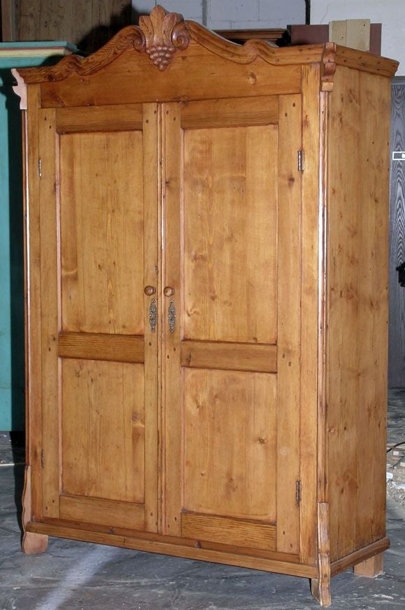Latvian Pine Armoire with Carved Grape Cluster Pediment, circa 1860