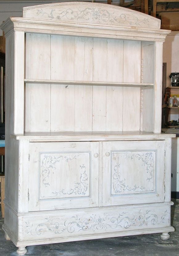 Antique hutch with Gustavian flair. We have added adjustable/removable shelves. Could also be used to house a large flat screen TV. The upper shelf is 52 X 13. Lower cabinet has a depth of 20.75