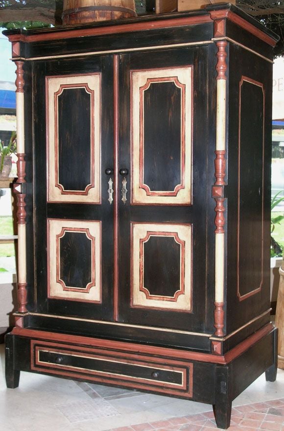 We have retrofitted this handsome armoire with retractable pocket doors. It would make a great TV cabinet, computer station or wardrobe. We can make any changes needed to the interior shelving.<br />
<br />
Additional images available.