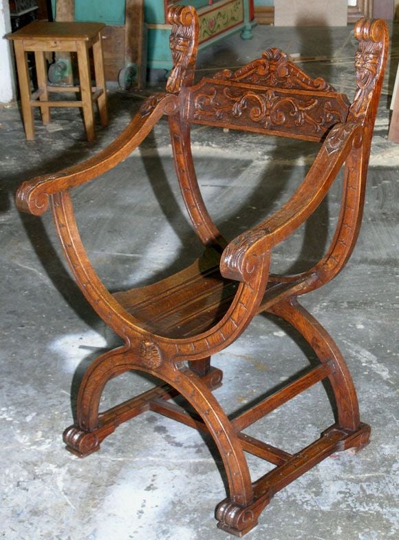 Extensively carved chair of an ancient Roman design. This style became popular again during the Renaissance.
  