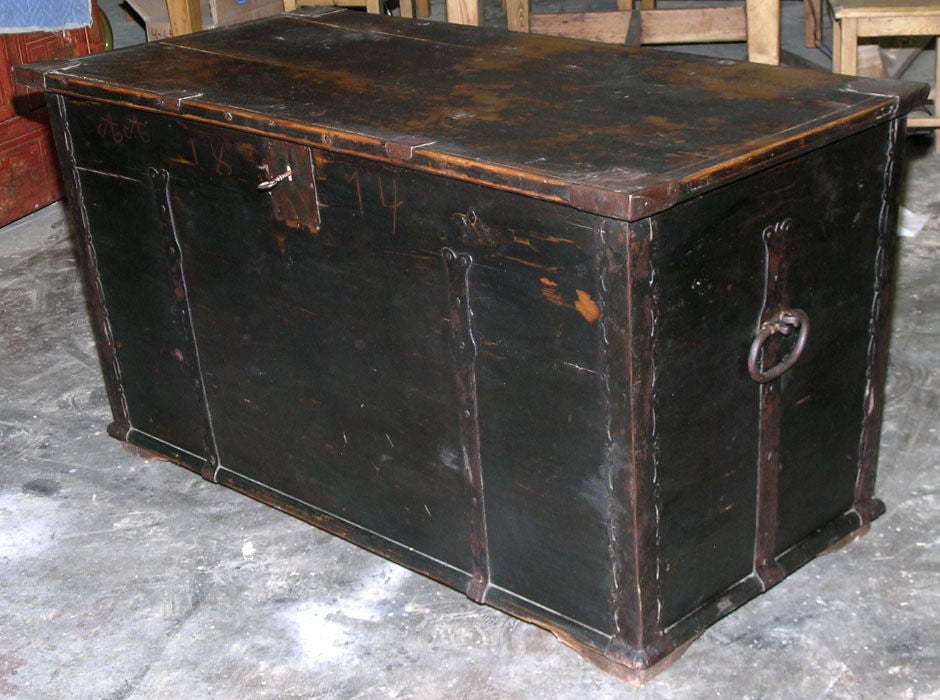 Dowry chest in original black paint with the initials AA dated 1874. Great hardware and interior candle box. Lock and key still work.