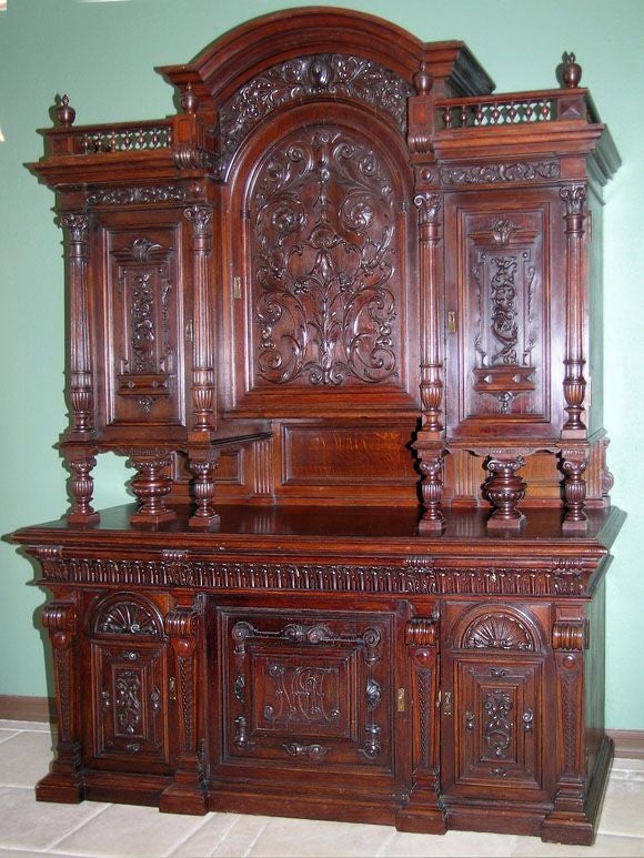 Magnificently carved oak buffet with six doors and three drawers. Intricately detailed. More pictures upon request.