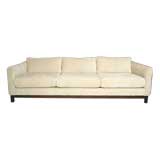 Chenille sofa with walnut base by Metropolitan