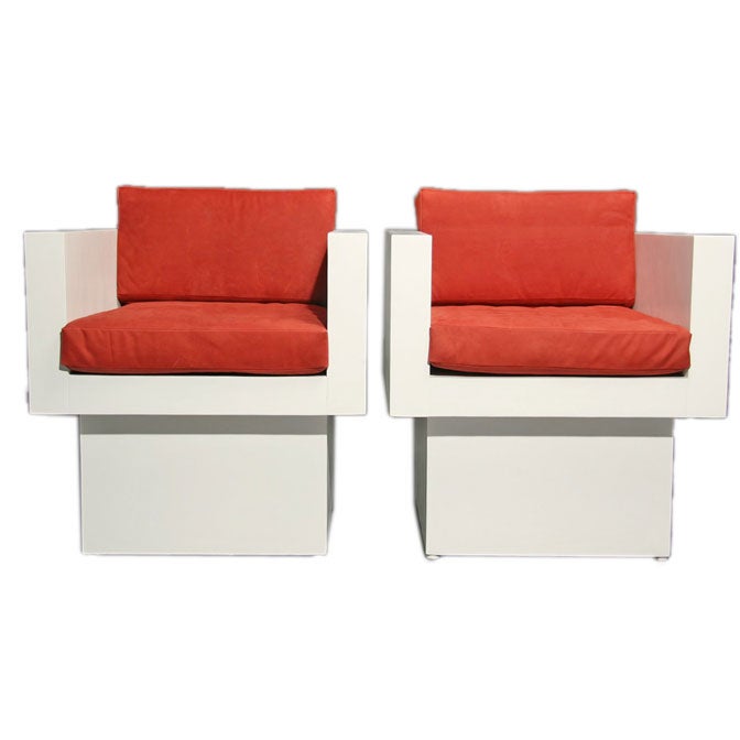 Pair of square white pedestal chairs with red suede cushions