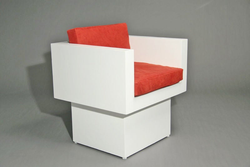 Pair of square white pedestal chairs with red suede cushions