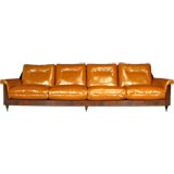 Rosewood case sofa with leather cushions by Jorge Zalszupin