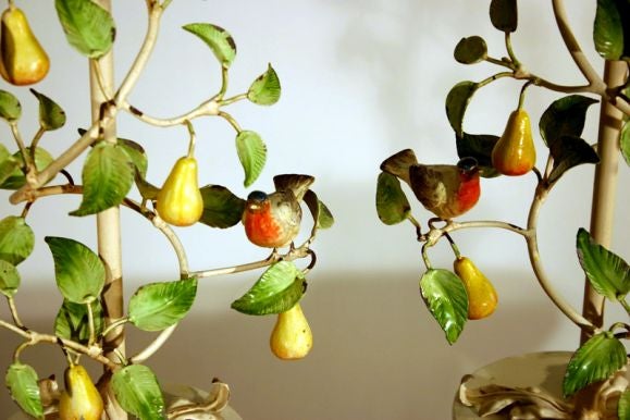 Painted tole Birds, leaves and fruit characterize this beautiful pair of lamps marked 