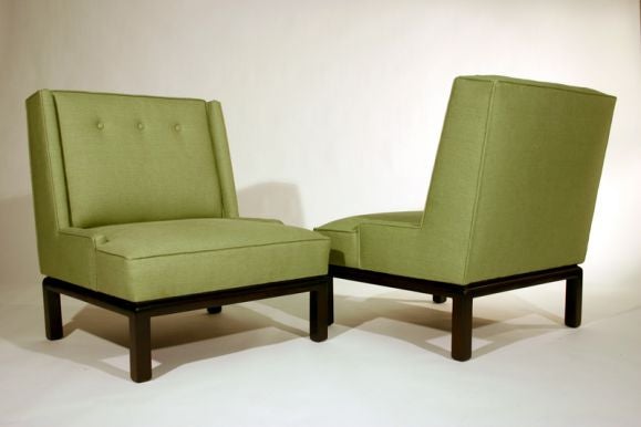 Green linen slipper chairs with ebonized bases