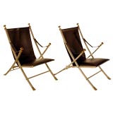 Pair of steel frame and leather lounge chairs by Maison Jansen