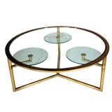 Round Italian glass-top brass coffee table